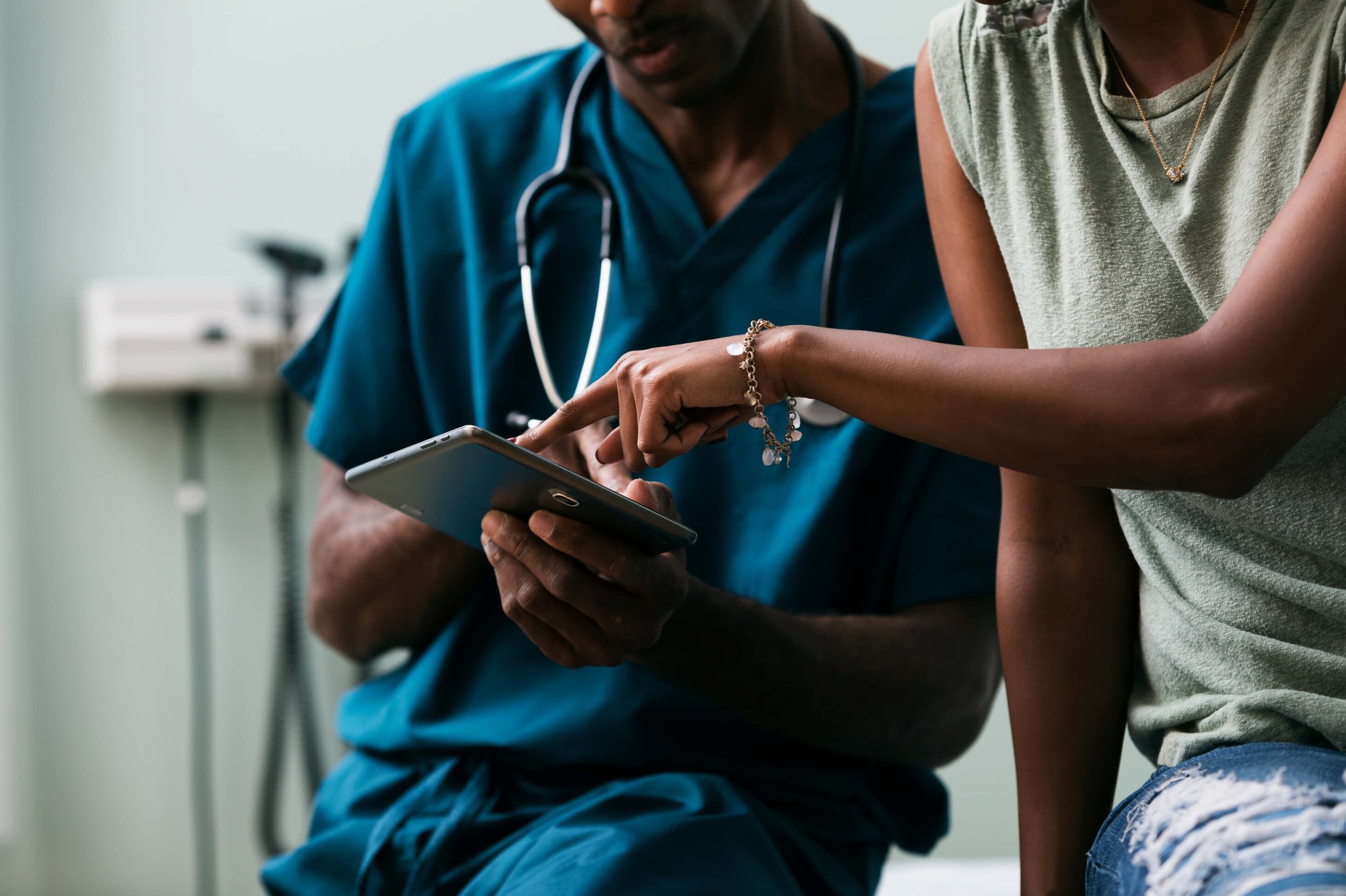 clinician-reading-tablet