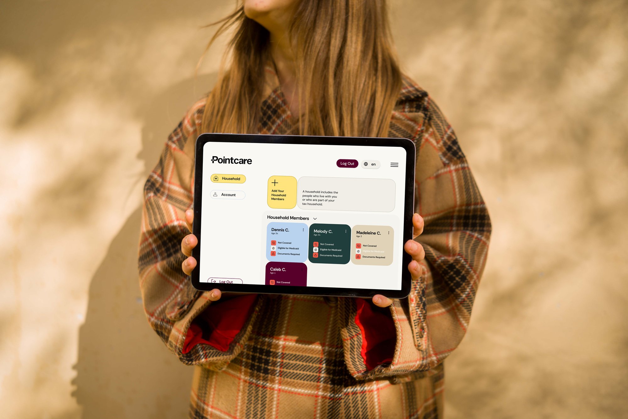 mockuuups-woman-in-an-autumn-coat-holding-an-ipad-air-mockup